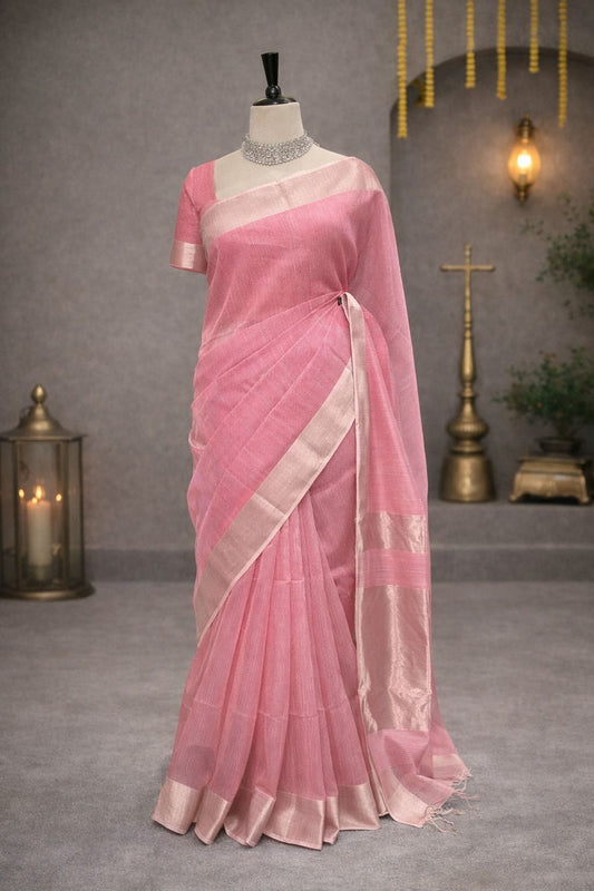 A soft pink Maheshwari saree that reflects grace, simplicity, and timeless tradition.