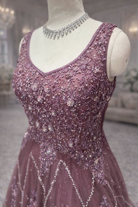 Elegant Dark Mauve Net Gown with Heavy Kardana & Sequin Work