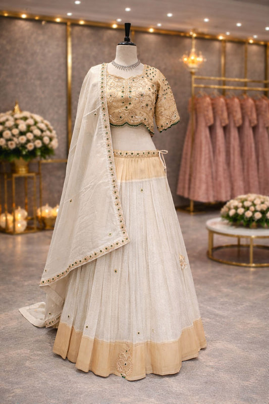 Royal Ivory & Gold Kanjivaram Silk Lehenga with Emerald Gotta Patti Highlights