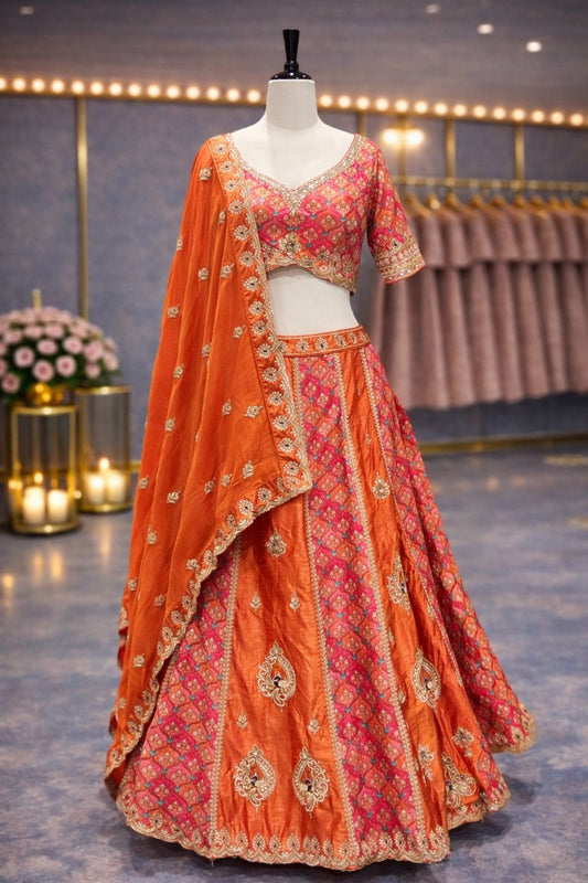 Vibrant Orange Runkart Silk Lehenga with Classic Zari Detailing