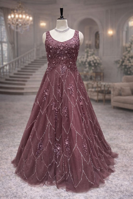 Elegant Dark Mauve Net Gown with Heavy Kardana & Sequin Work