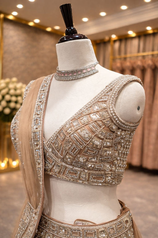 Shimmering Beige Gold Net Lehenga with Hand Kardana & Sequin Detailing