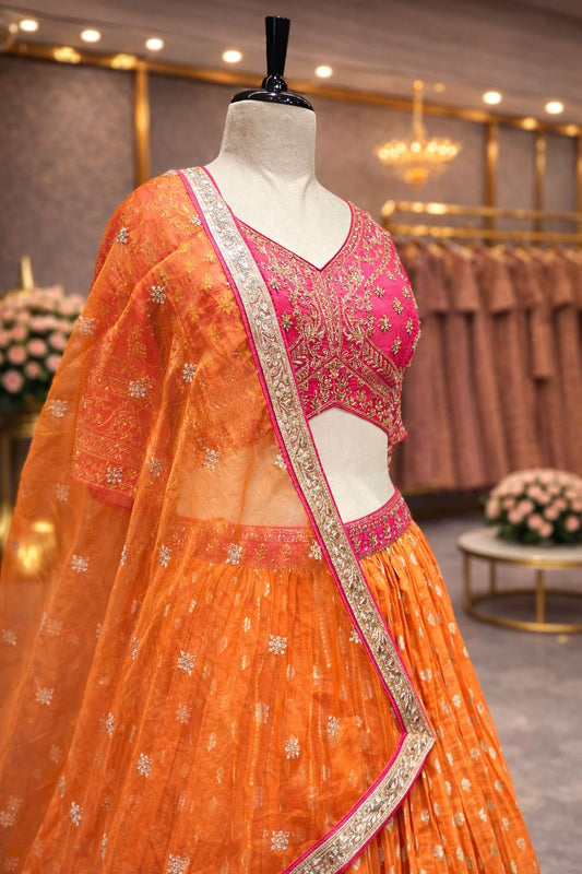 Rani & Orange Banarasi Lehenga with Handcrafted Kardana–Arri Blouse