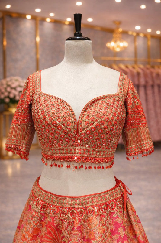 Vibrant Red-Orange Bridal Lehenga with Banarasi Weave & Mirror Dori Work Blouse